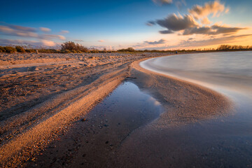 Baltic sea beach during sunset in Rewa. Baltic Sea. Poland