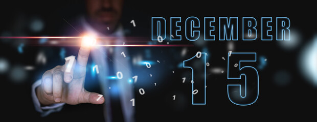 december 15th. Day 15 of month,advertising or high-tech calendar, man in suit presses bright virtual button winter month, day of the year concept