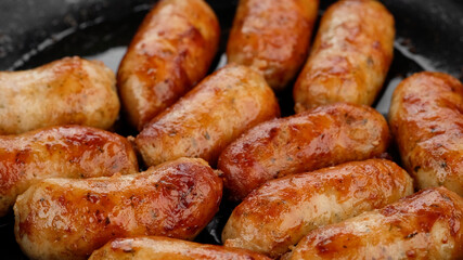 sausages fried on grill top view