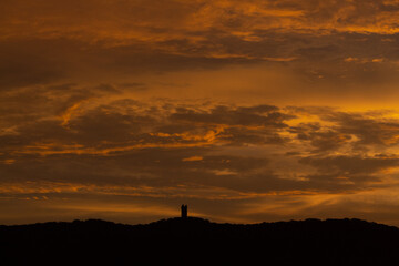 Orange clouds in the sky during the sunset