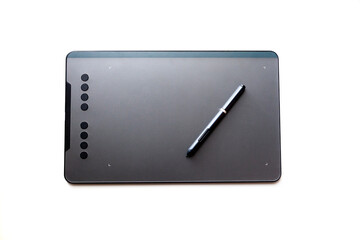 black graphic tablet for a Retoucher or artist with a pen on a white background, isolated