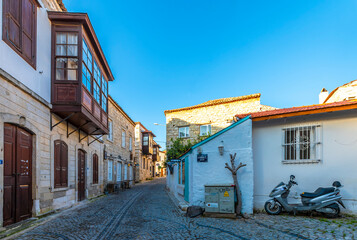 Fototapeta na wymiar Alacati street view in Alacati Town. Alacati is populer historical tourist destination in Turkey.