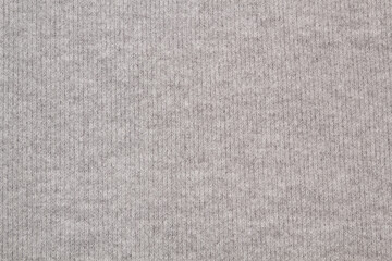 Fototapeta na wymiar Texture of knitted wool sweater