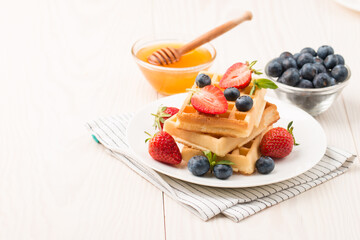 Belgian waffles for breakfast. Dessert food concept. 