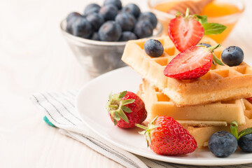 Belgian waffles for breakfast. Dessert food concept. 