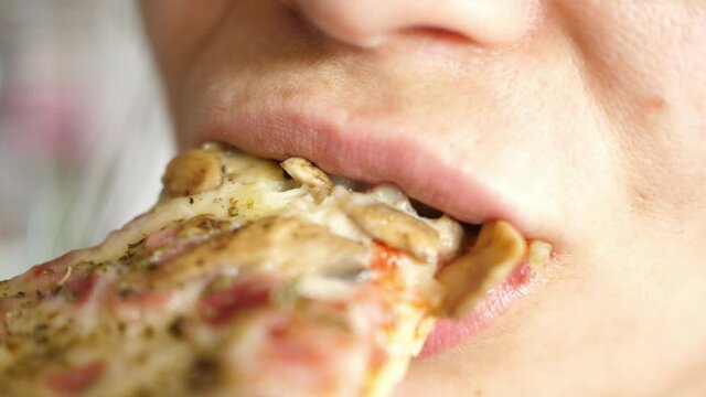 woman eat eating mouth close macro Pizza capricciosa cheese ham mushrooms