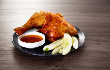 roasted chicken with chilli sauce and vegetables