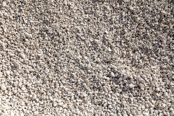 Stone gravel at a construction site as a background.
