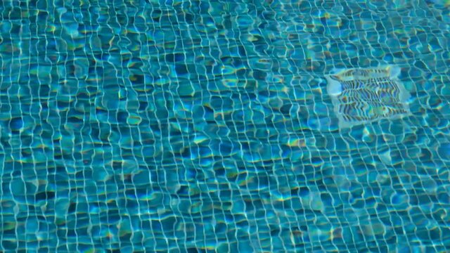 The water filter in the pool floor. Pool cleaning filter.	