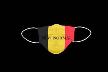 New normal text on face mask with flag of Belgium