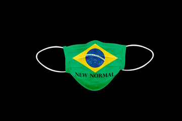 New normal text on face mask with flag of Brazil