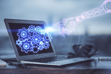 Double exposure of desktop computer and technology theme hologram. Concept of software development.