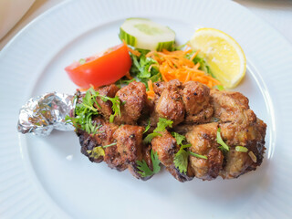 plat indien Bara Kabab : Jarret d’agneau grillé au four tandoori