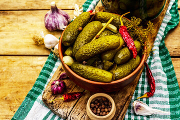 Marinated pickled cucumbers with spices and herbs