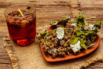 Dry leaves, flowers and berries of raspberry for cooking healthy herbal tea