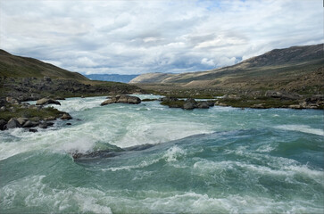 Melting glacier during short polar summer in Greenland