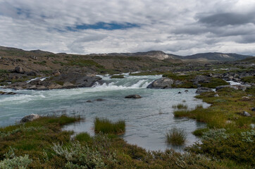 Salmon fishing in Greenland tundra river