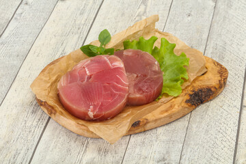 Raw tuna round steak for grill