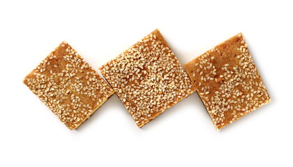 Cornbread slices with sesame seeds, traditional breakfast pastry isolated on white background, top view