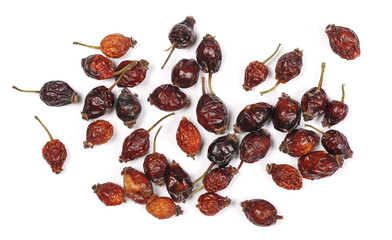 Dry rose hips isolated on white background, top view