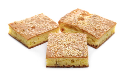 Cornbread slices with sesame seeds, traditional breakfast pastry isolated on white background