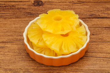 Marinated pineapple rings in the bowl