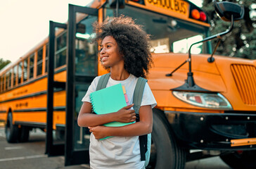 Girl near school bus