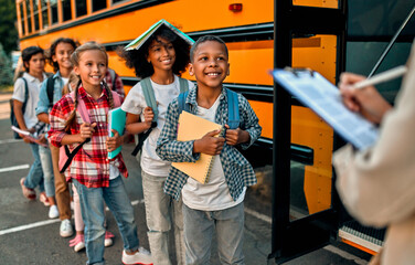 Children near school bus