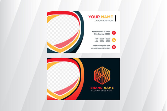 abstract modern business card design template in white and dark green background with shield shape as space for photo use green, red, and yellow element. Layout in horizontal. 