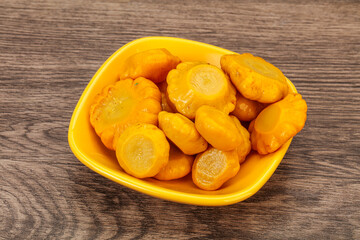 Marinated yellow patisson in the bowl
