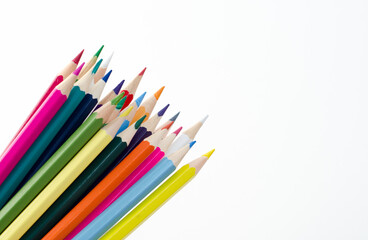 colored pencils on white background