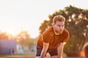 Modern young man working out in an urban park.