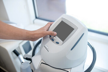 Doctor using a novel professional ultrasound machine