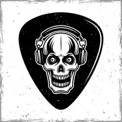 Guitar mediator with horned skull in headphones