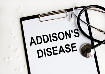 The inscription on the paper tablet is ADDISON'S DISEASE. Around the tablet stethoscope.