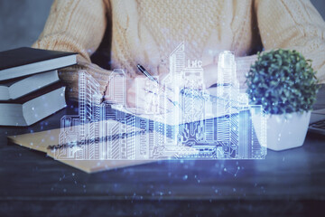 IOT drawing over writing hands in notepad background. Concept of smart home. Multi exposure