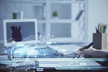 Multi exposure of woman hands on background with technology coding hologram. Data concept.