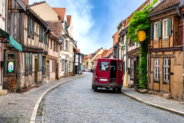 Narrow street in the idyllic old town of the Tangermünde with old dilapidated half-timbered house