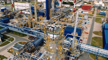 Industrial CO2 global warming emissions of a petrochemistry oil refinery in Gdansk aerial.  - obrazy, fototapety, plakaty