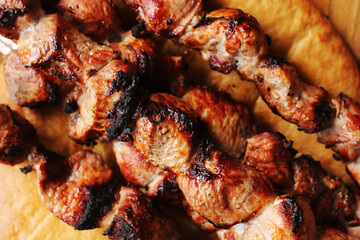 pork skewers on a wooden table