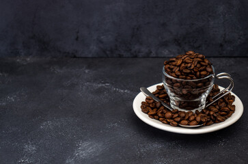 Coffee cup with roasted beans.
