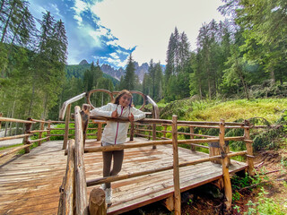 Young girl happy during a mountain trip