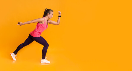 Fototapeta na wymiar Motivated Young Woman In Sportswear Running Over Yellow Background