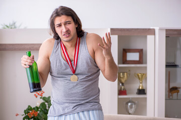 Male ex-champion american football player suffering from alcohol