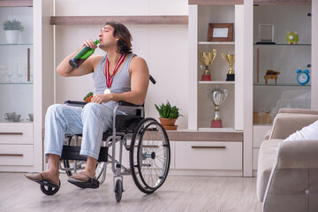 Man ex-champion in wheel-chair suffering from alcoholism