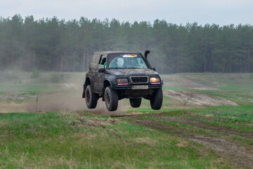 Amazing UTV driving in mud at Autumn day
