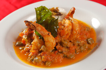 Shrimp with caper, chaya leaf and steamed rice.