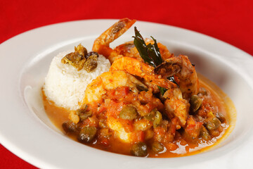 Shrimp with caper, chaya leaf and steamed rice.