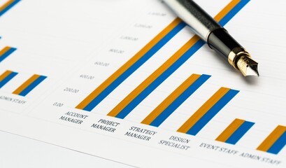 Pen on Business Graphs
