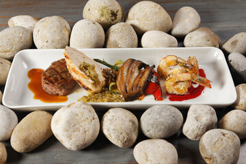 Premium Angus Beef Filet Mignon and Supreme chicken, shrimp and Portobello mushrooms.
